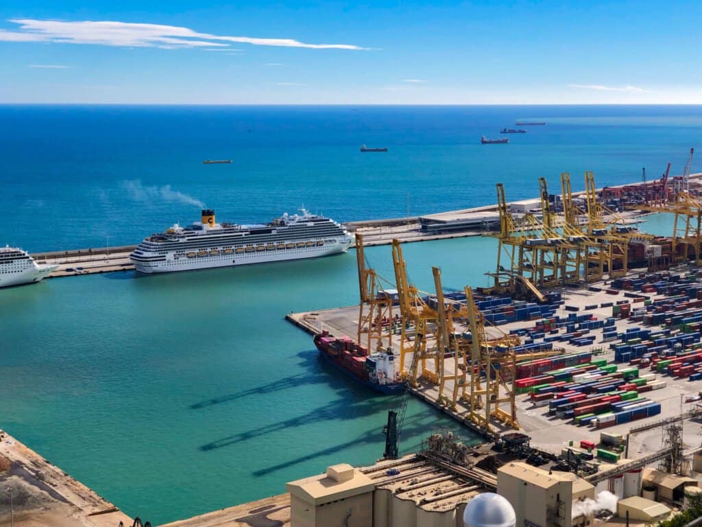 Photo by Marc Coenen: https://www.pexels.com/photo/tropical-industrial-harbor-with-cruise-ships-4605347/ Pexels