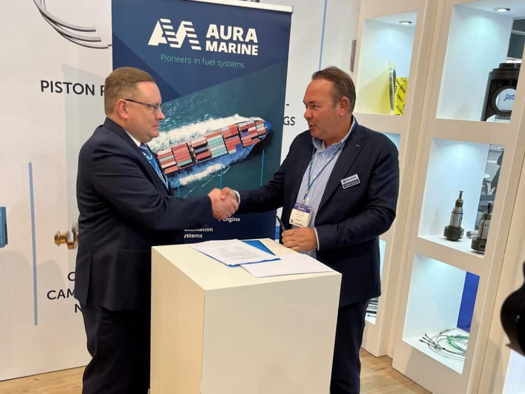John Bergman, Auramarine CEO, and Adriaan Verhoef, THB Verhoef CEO signing agreement at Europort John Bergman, Auramarine CEO, and Adriaan Verhoef, THB Verhoef CEO signing agreement at Europort